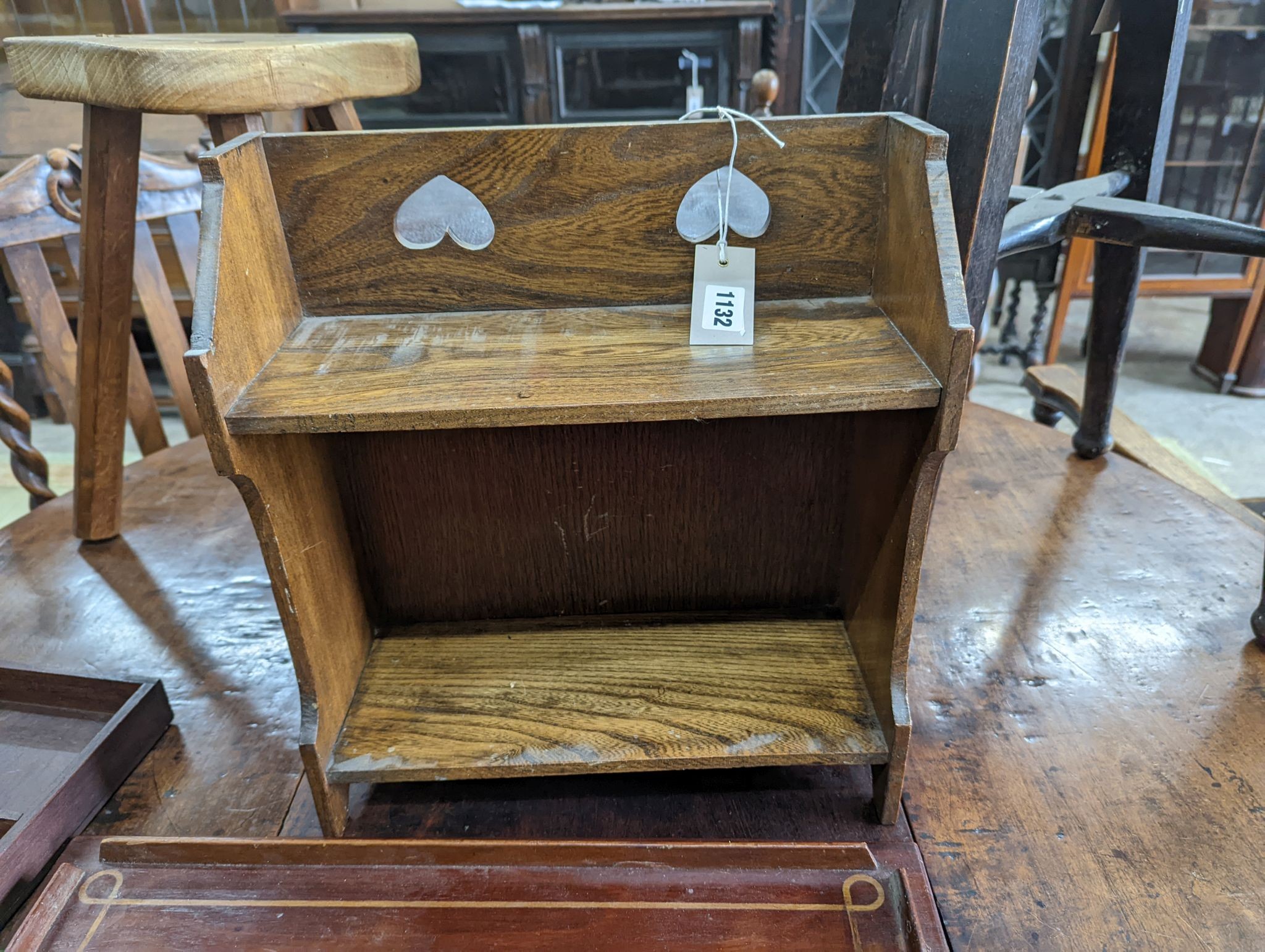 Four assorted stools, two trays, a bookstand and a wall shelf